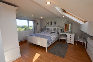 Bedroom One- click for photo gallery